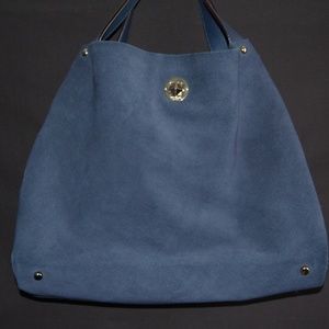 Blue suede handbag by Kate Spade.